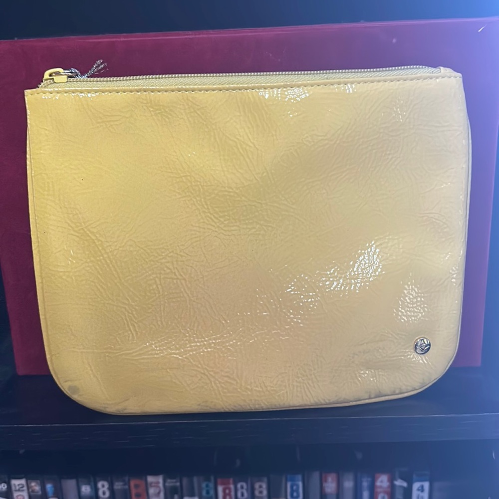 Stephanie Johnson yellow cosmetic bag